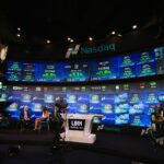 Nasdaq MarketSite studio in Times Square with stock tickers on video walls