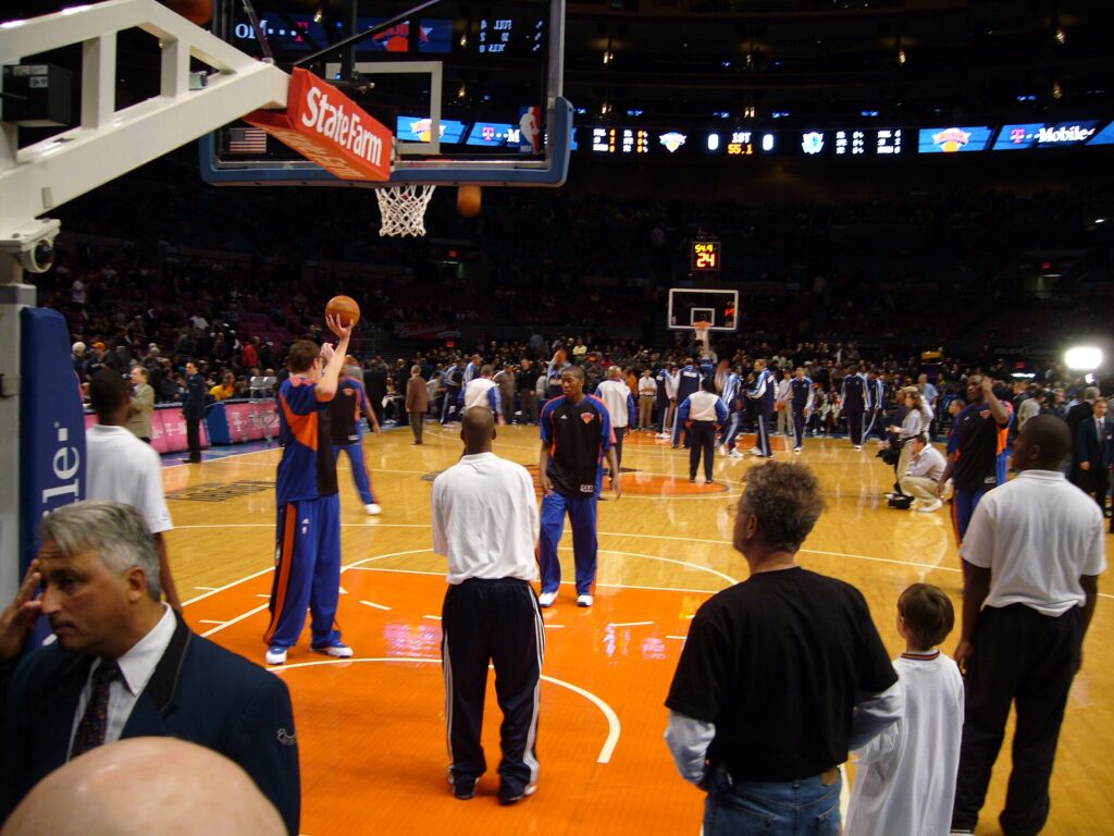 Knicks players warming up on the court at Madison Square Garden before an NBA game