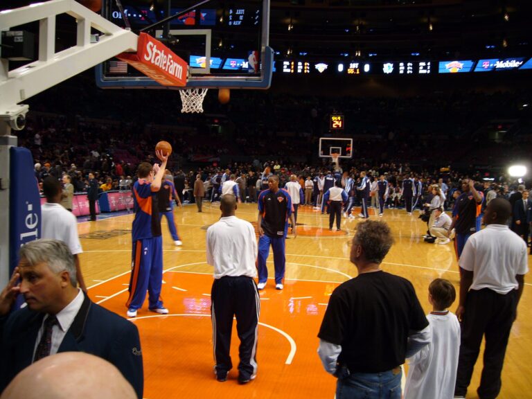 Knicks players warming up on the court at Madison Square Garden before an NBA game